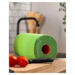 Limonkowy ręcznik papierowy Renova Red Label – rozwinięta limonkowa rolka w jasnej kuchennej aranżacji