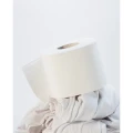 Renova TextilPapier – miękka rolka na tle jasnych tekstyliów